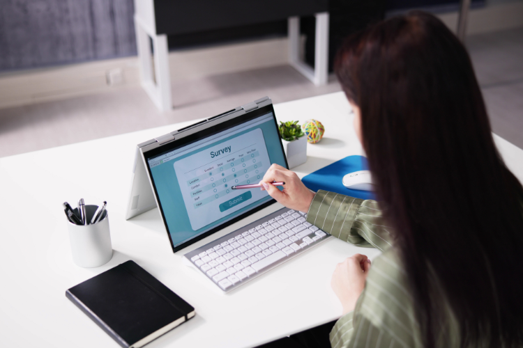 woman completing online survey 